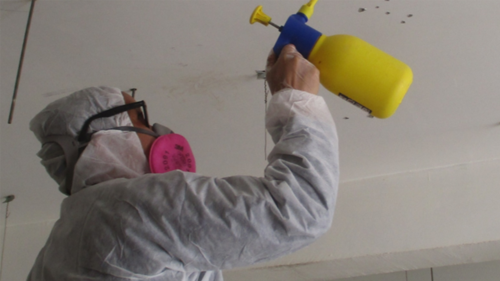 Asbestos contaminated area before treatment